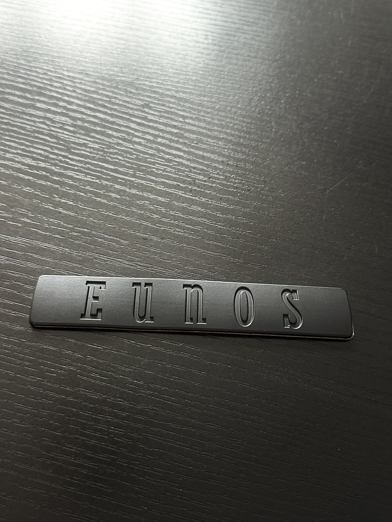 Black Eunos Logo